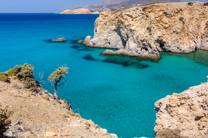 Beautiful coastline with turquoise waters near Tsigrado, Milos island, Cyclades, Greece